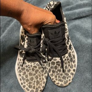 Adidas Women’s size 11 leopard print sneakers great condition.